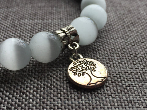 Bracelet breloque arbre de vie argent et bille de verre blanche Comme un ange