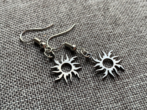 Boucles d’oreilles breloque soleil argent en stainless Comme un ange