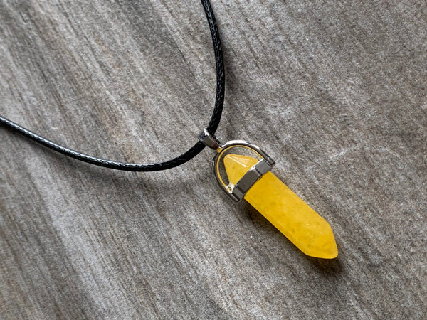 Collier pendule jaune sur corde de cuir pendulum mystique Comme un ange