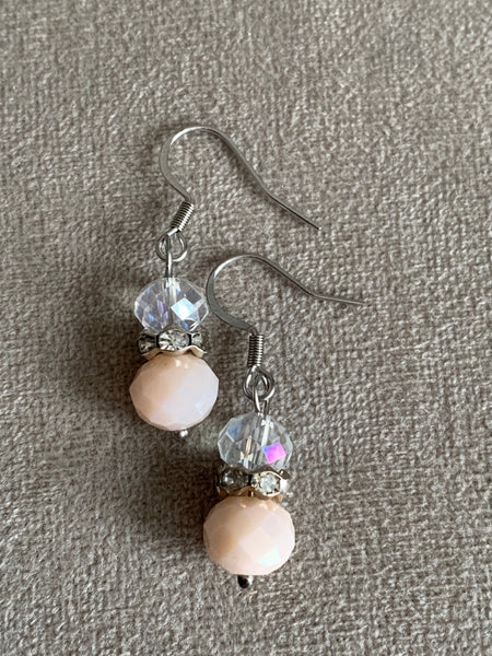 Boucles d’oreilles billes transparente et rose Comme un ange