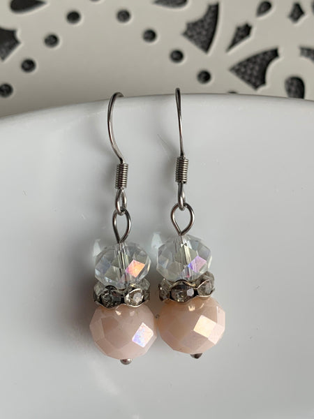 Boucles d’oreilles billes transparente et rose Comme un ange