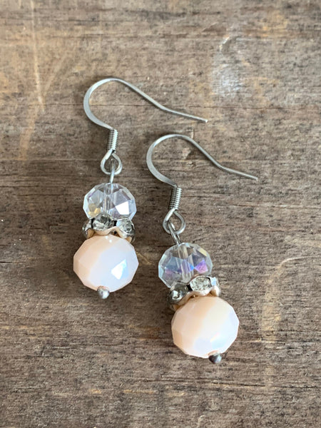 Boucles d’oreilles billes transparente et rose Comme un ange