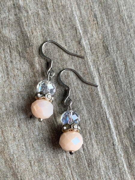 Boucles d’oreilles billes transparente et rose Comme un ange