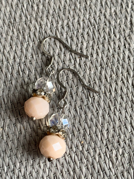 Boucles d’oreilles billes transparente et rose Comme un ange