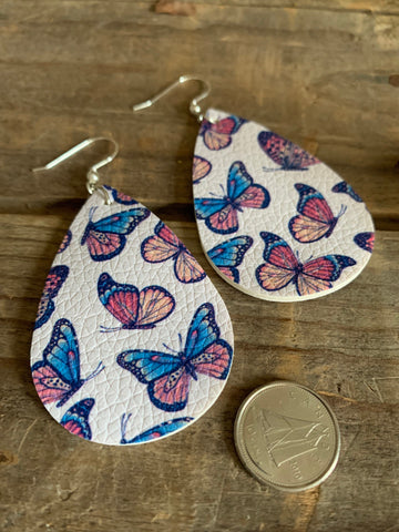 Boucles d’oreilles cuir papillon bleu rose Comme un ange