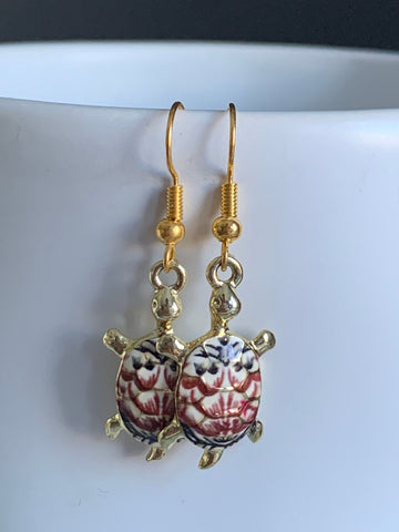 Boucles d’oreilles breloque tortue rouge Comme un ange