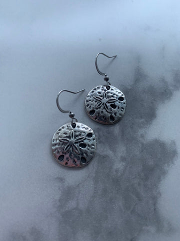 Boucles d’oreilles breloque dollars de sable argent Comme un ange