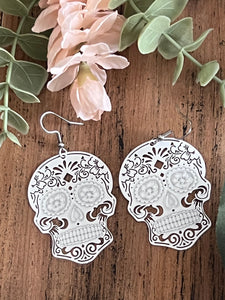 Boucles oreilles tête de squelette blanche Comme un ange