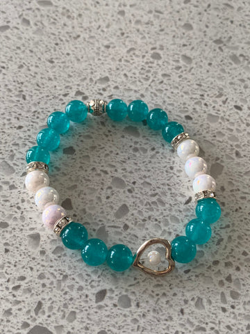 Bracelet à billes élastique coeur et perles turquoise et blanches Comme un ange